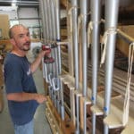 Technician Wayne putting finishing touches on racking