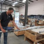 James Leek Assembling newly repaired Bombarde to build racking